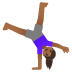 woman cartwheeling, medium-dark skin tone